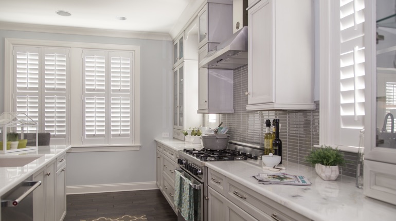 Polywood shutters in Indianapolis kitchen with modern appliances.